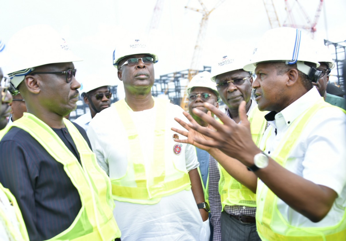 Group President/Chief Executive, Dangote Industries Limited, Aliko Dangote (right) stresses a point to MD, Nigerian National Petroleum Corporation (NNPC), Mallam Mele Kyari (left) and Timipre Sylva, Nigeria's minister of state for petroleum resources aft the Dangote Petroleum Refinery at the Petrochemical complex located at the Lekki Free Trade Zone in Lagos, Nigeria.