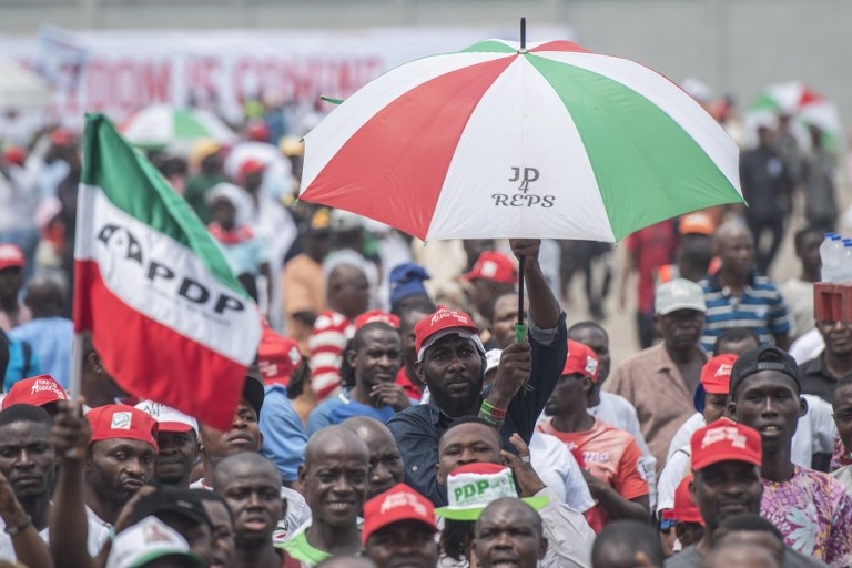 Supporters of the People's Democratic Party (PDP) attend a campaign rally
