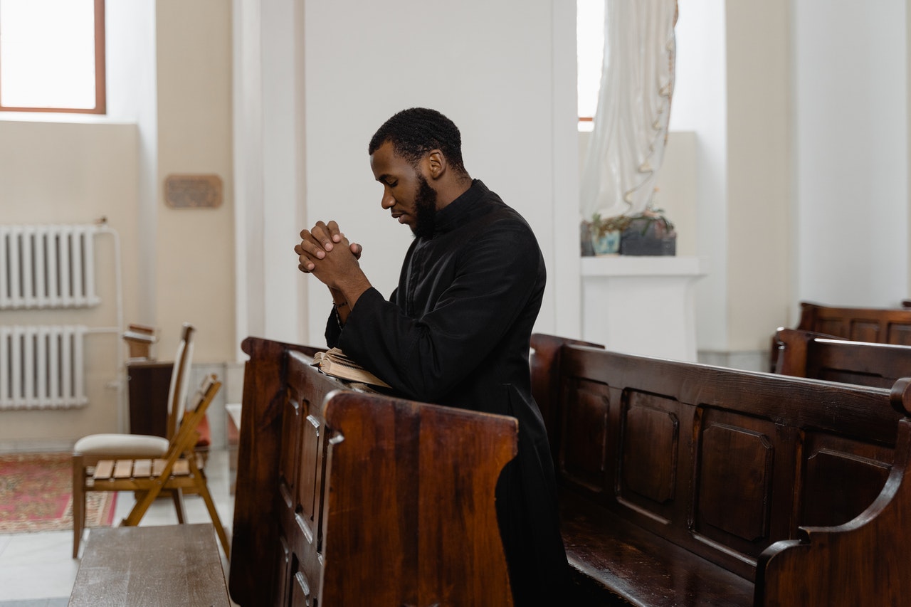 prayer man in church praying