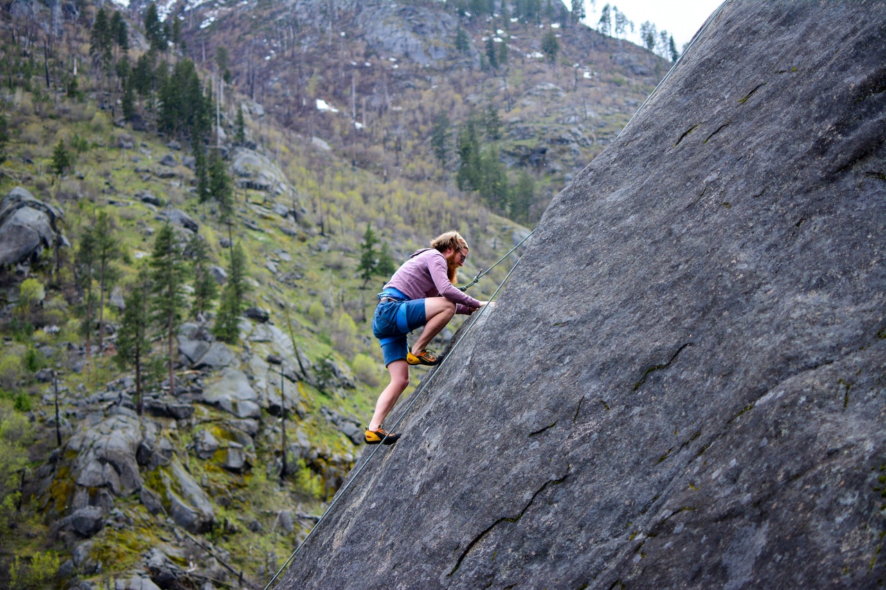 Joseph Prince man climbing mountain rock hiking