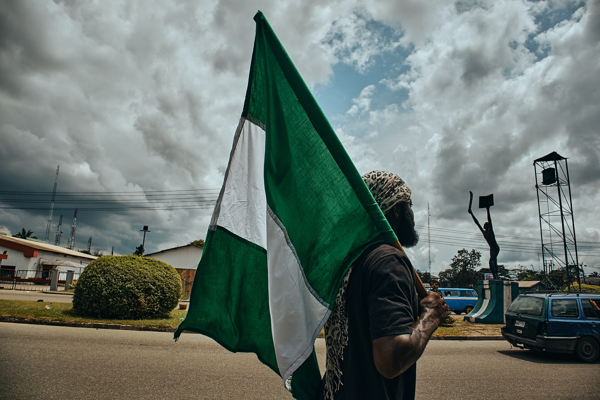 Nigeria Nigerians entertainment activities man with Nigerian flag