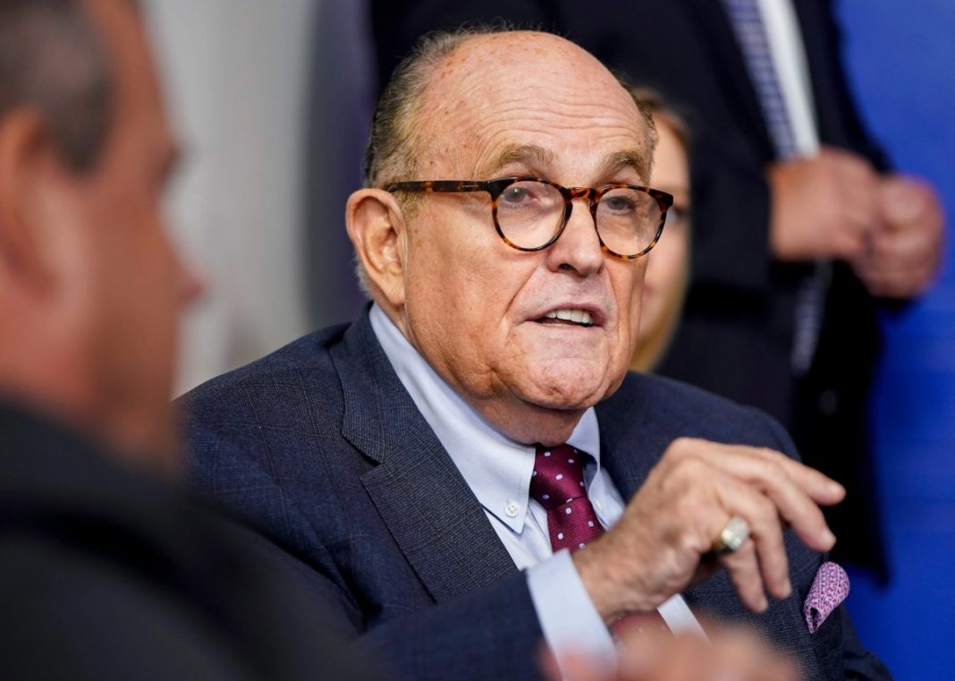 Former New York Mayor Rudy Giuliani speaks during a news