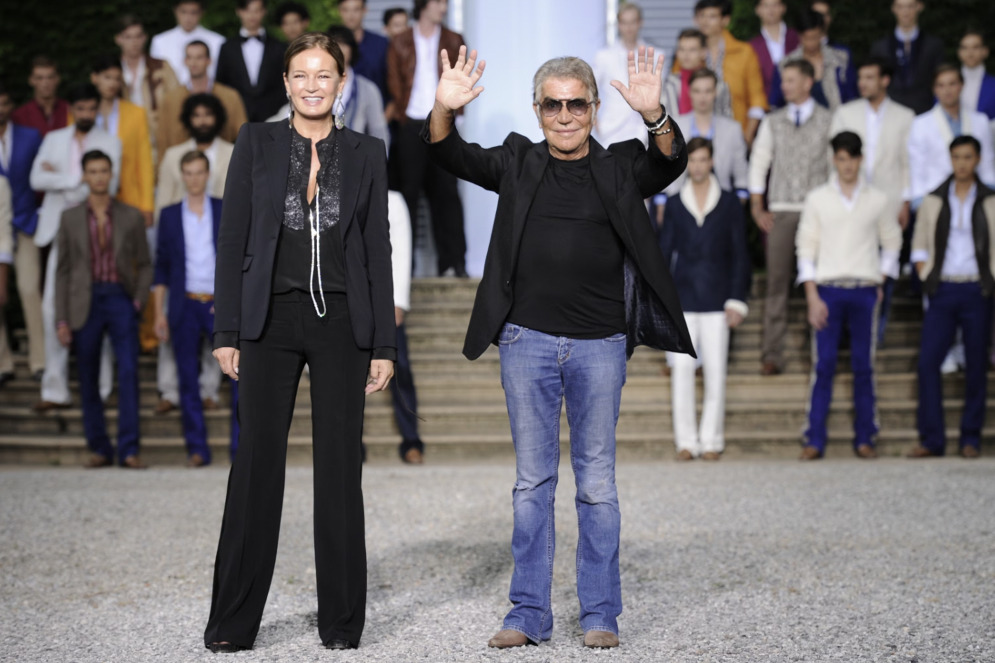 Fashion designer Roberto Cavalli and his wife Eva acknowledge the audience after the Roberto Cavalli Spring-Summer 2012 Menswear collection, June 18, 2011, during the Men's fashion week in Milan.Olivier Morin/AFP via Getty Images