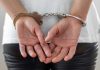 She Took a DNA Test ‘For Fun.’ It Led to Her Grandmother Being Charged With Murder murder, Woman Arrested handcuffed, jailed, handcuff