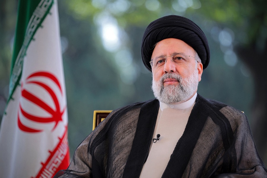 FILE: This handout picture provided by the Iranian presidency shows Iran's President Ebrahim Raisi shows him addressing and giving the annual address to the nation for Nowruz, the Persian New Year, in Tehran on March 20, 2024. | Iranian Presidency/AFP