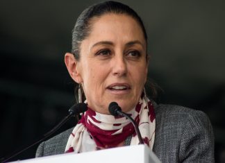 Mexico’s President Claudia Sheinbaum Threatens Legal Action After Elon Musk Alleges Cartel Links Musk, tariffs, Claudia Sheinbaum Pardo speaks during the inauguration ceremony of the Monumental Carpet in the capital's Zócalo. | Gabriela