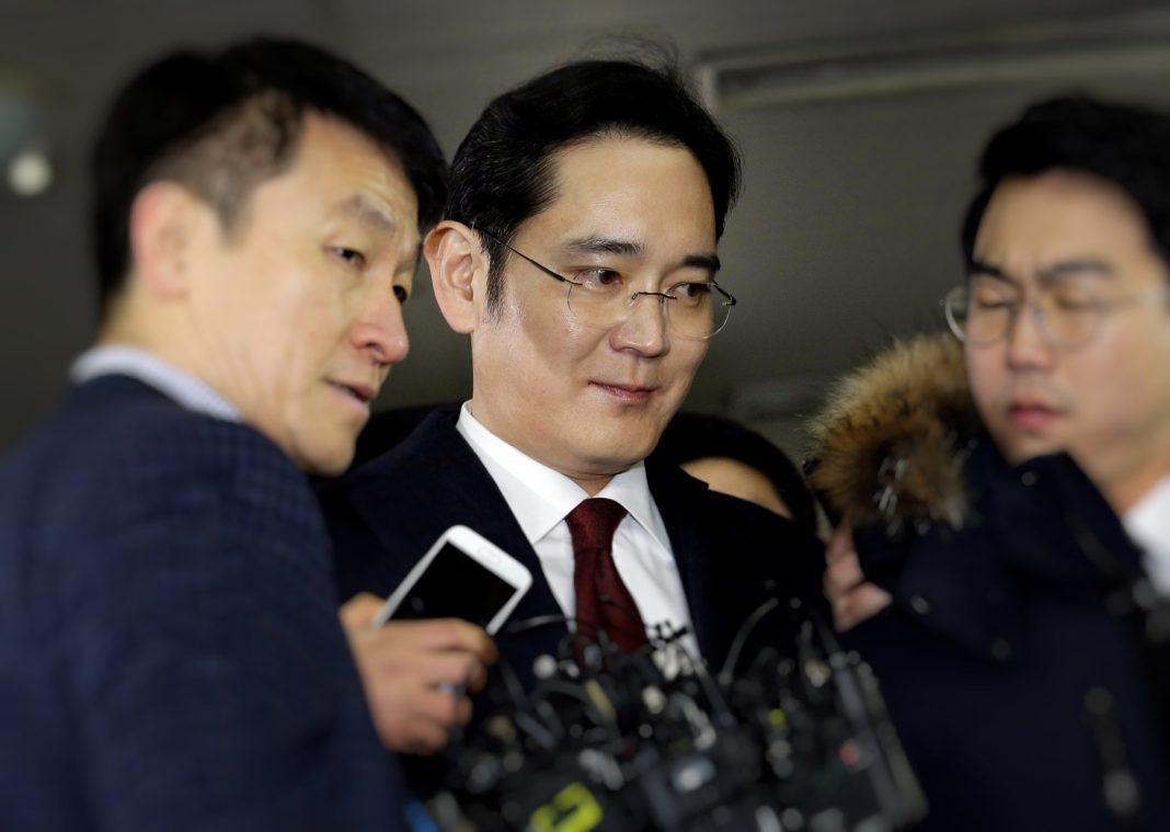 Jay Y. Lee (C), vice chairman of Samsung, arrives to be questioned as a suspect in a bribery case in the corruption scandal that led to the president's impeachment, Seoul, January 12. Ahn Young-joon/REUTERS