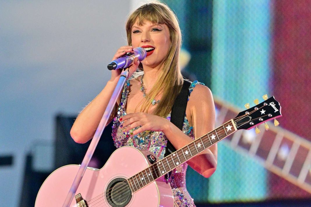 Taylor Swift performs during her Eras Tour. | Getty