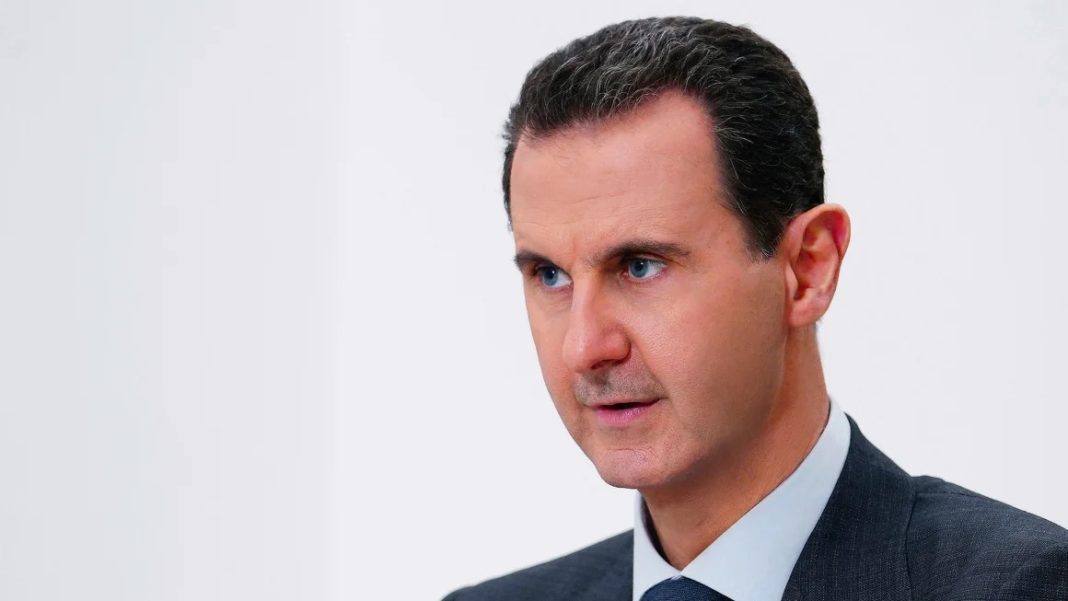 Syrian President Bashar al-Assad speaks in Damascus in 2019. | SANA/AP  