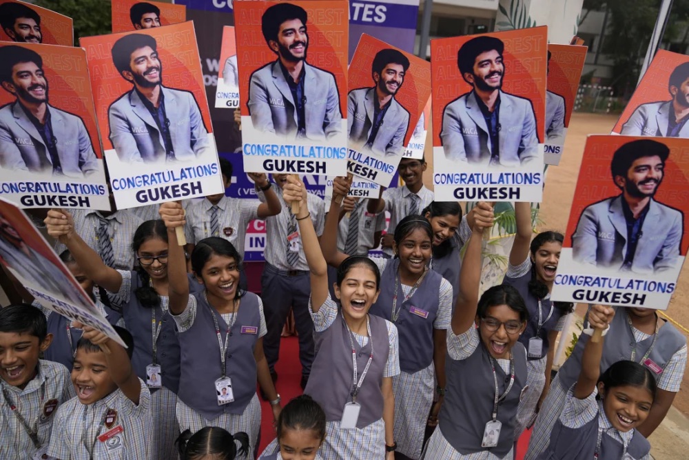 Students at Gukesh Dommaraju's school in Chennai celebrate after Gukesh became the youngest ever World Chess Champion