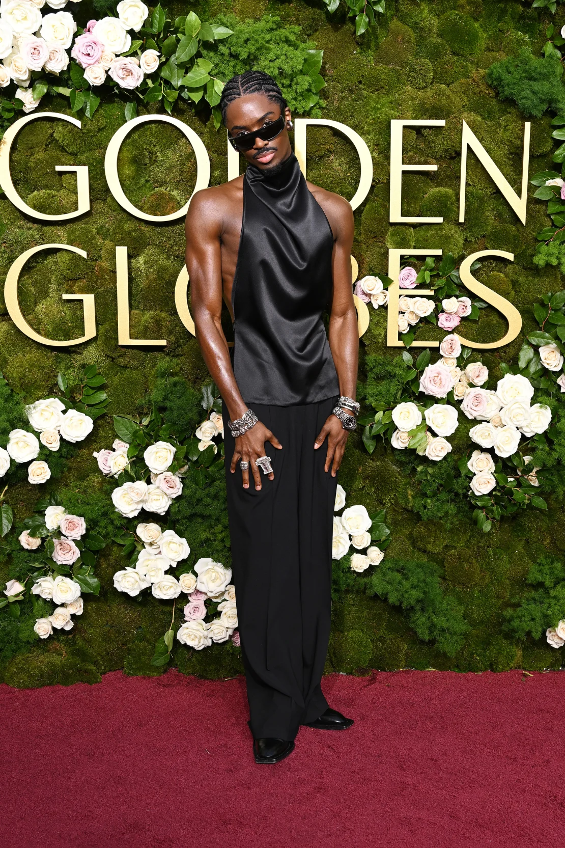 Alton Mason in a satin blouse and suit trousers from Dolce & Gabbana. Gilbert Flores/GG2025/Penske Media/Getty Images