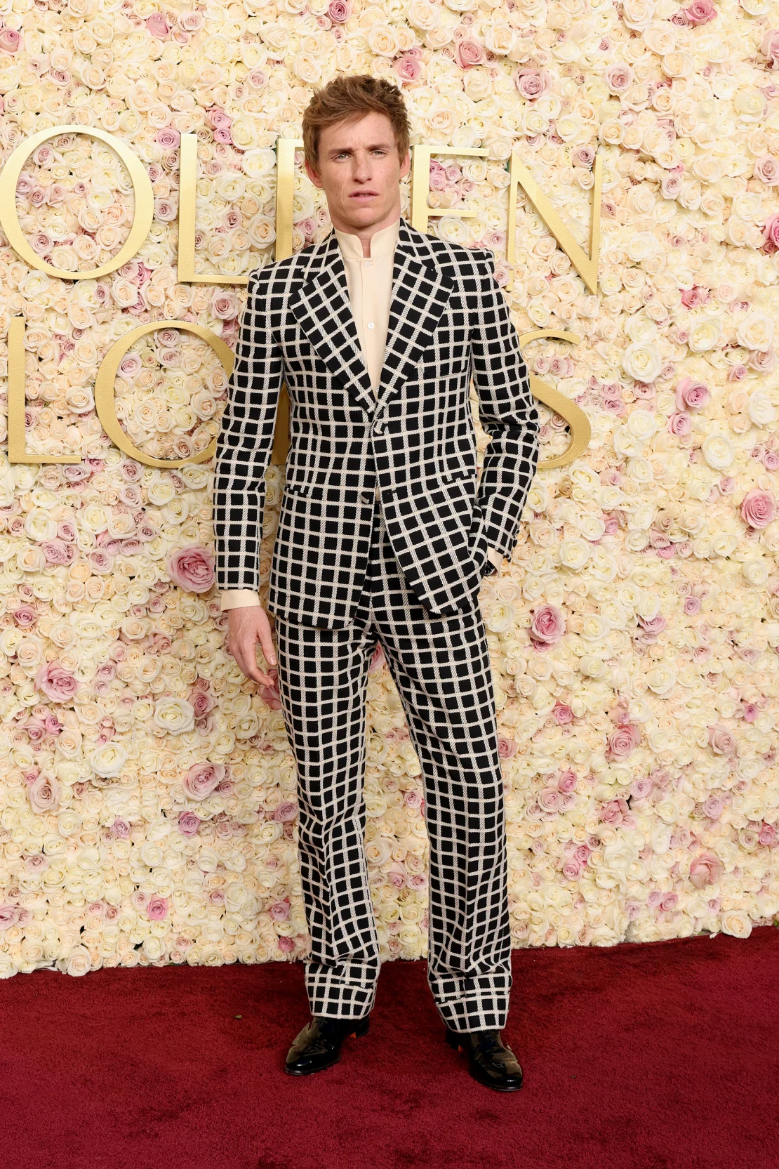 Eddie Redmayne in a Valentino suit. Amy Sussman/Getty Images