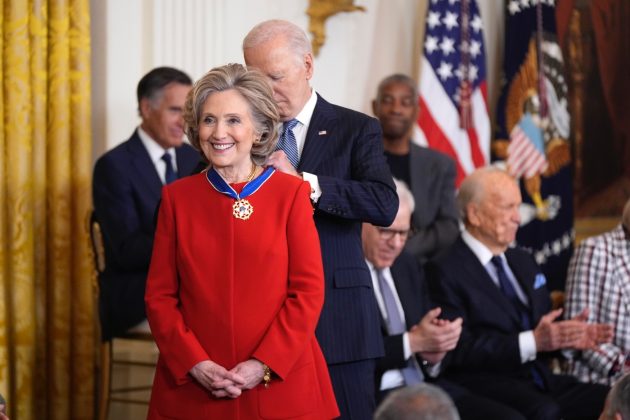 President Joe Biden presents the Presidential Medal of Freedom to former Secretary of State Hillary Clinton, in the East Room of the White House, in Washington, on Jan. 4, 2025. (AP Photo/Manuel Balce Ceneta)