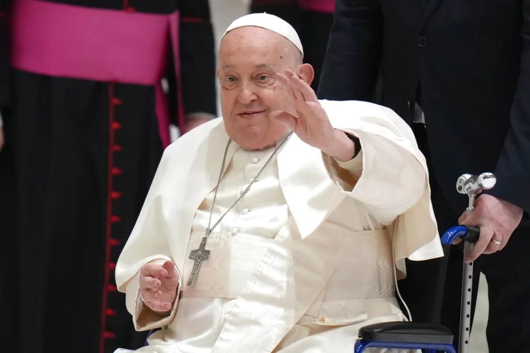 Kidney Failure, Pope Francis waves as he arrives for his weekly general audience in the Paul VI Hall, at the Vatican, Wednesday, Feb. 12, 2025. | AP Photo/Alessandra Tarantino