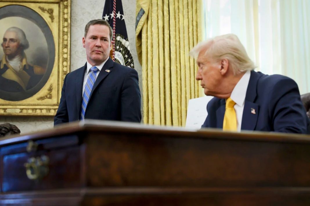 White House national security adviser Mike Waltz listens as President Donald Trump speaks in the Oval Office on March 7, 2025. | Leah Millis/Pool via AP