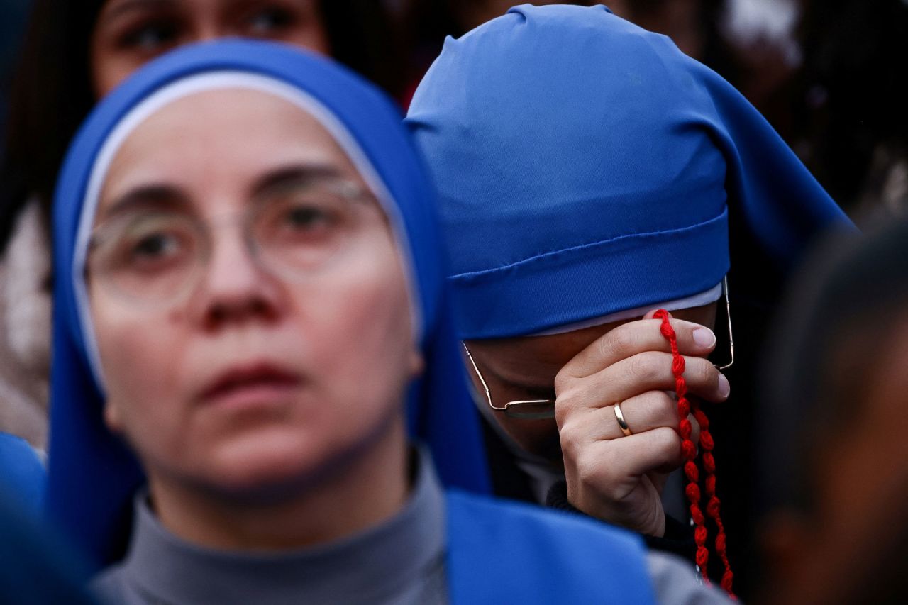Nuns attend a rosary prayer for Pope Francis in St. Peter's Square at the Vatican on Monday, April 21, 2025. | Yara Nardi/Reuters