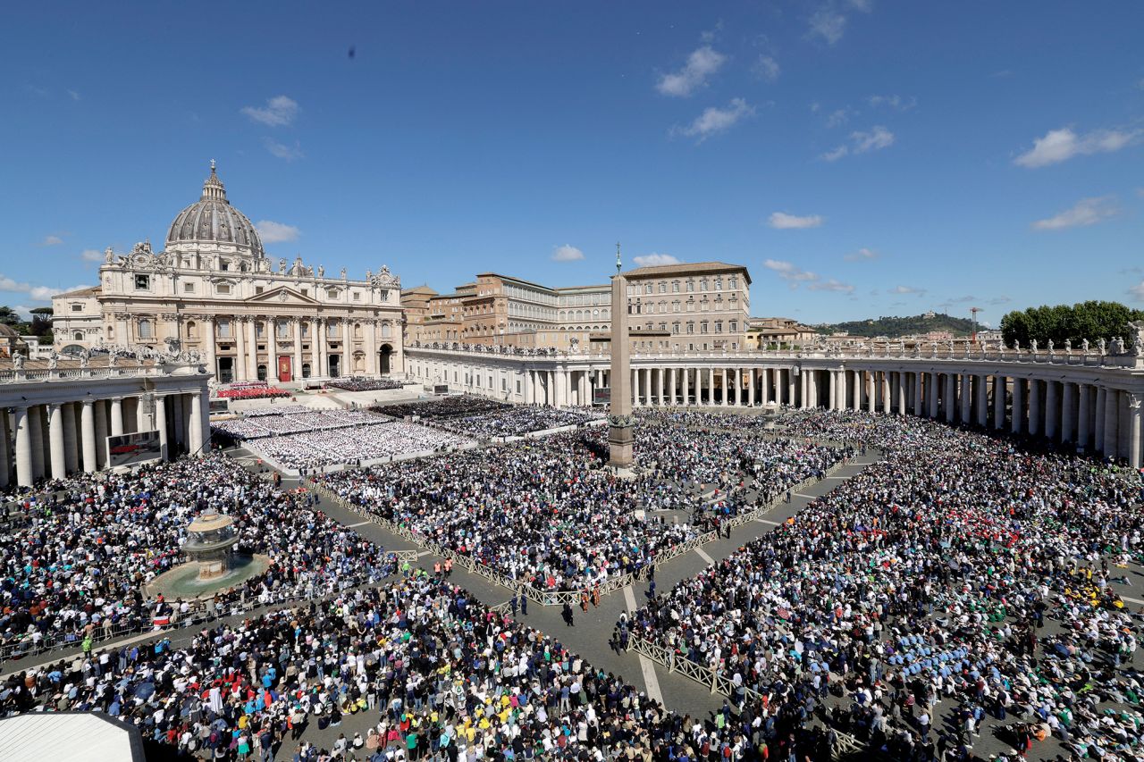 People attend the funeral Mass of Pope Francis, at St. Peter's Square, at the Vatican, on Saturday. Remo Casilli/Reuters