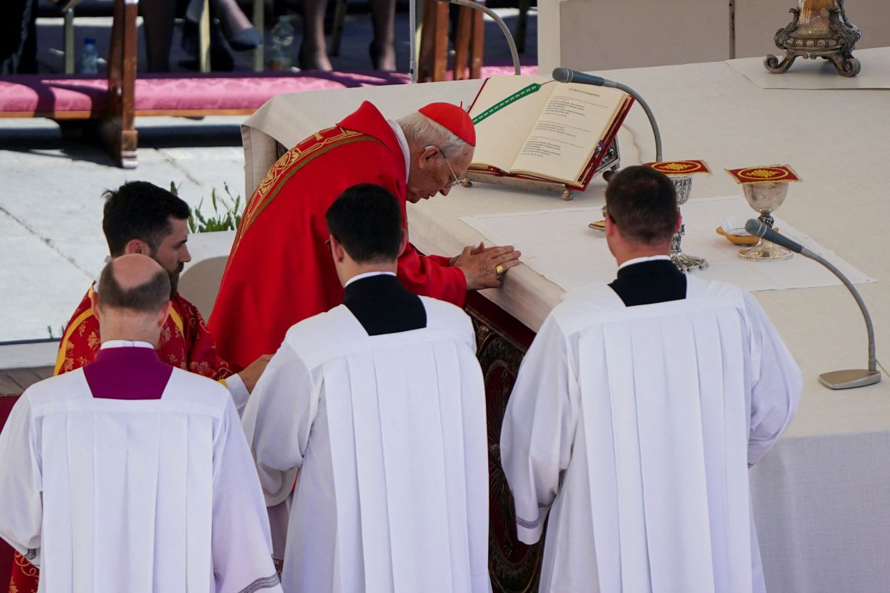 Cardinal Giovanni Battista Re leads the funeral Mass of Pope Francis in St. Peter's Square. Nathan Howard/Reuters