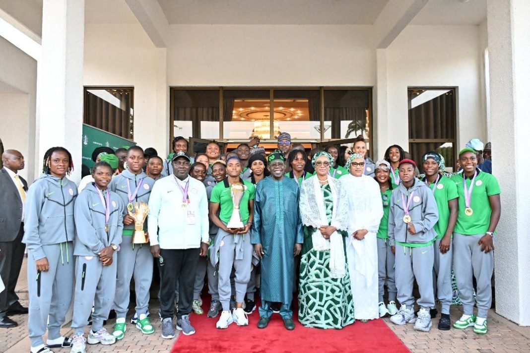 President Bola Tinubu and First Lady Remi Tinubu pose with the victorious Super Falcon at the Presidential Villa after their successful Women’s Africa Cup of Nations campaign