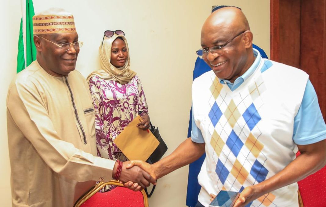 Senator David Mark shakes hands with Atiku Abubakar as African Democratic Congress (ADC) leaders hold meeting in Abuja on Thursday, September 25, 2025