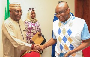 Senator David Mark shakes hands with Atiku Abubakar as African Democratic Congress (ADC) leaders hold meeting in Abuja on Thursday, September 25, 2025