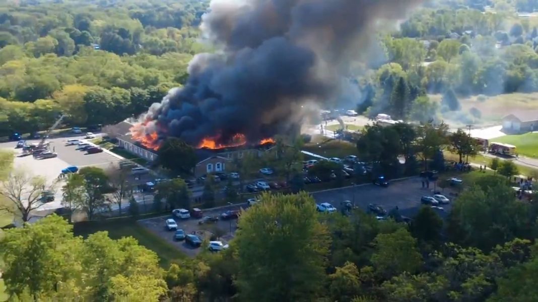 Crews battle large fire at Church of Jesus Christ of Latter-day Saints in Grand Blanc, Michigan, on Sunday, September 28.