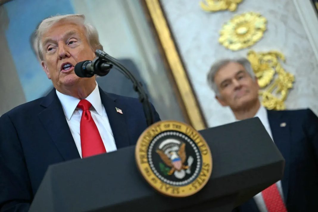 US President Donald Trump makes an announcement in the Oval Office of the White House in Washington, DC, on October 16, 2025. | Andrew Caballero-Reynolds/AFP via Getty Images  