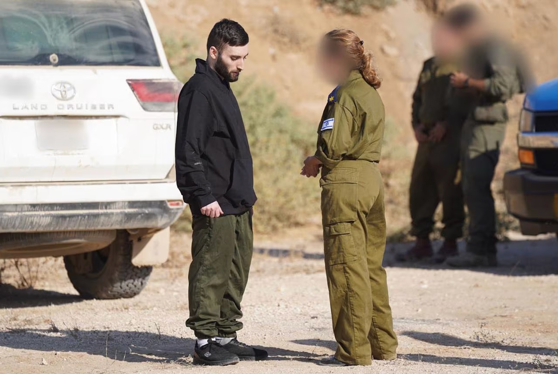 Matan Angrest with an IDF representative. | GPO 