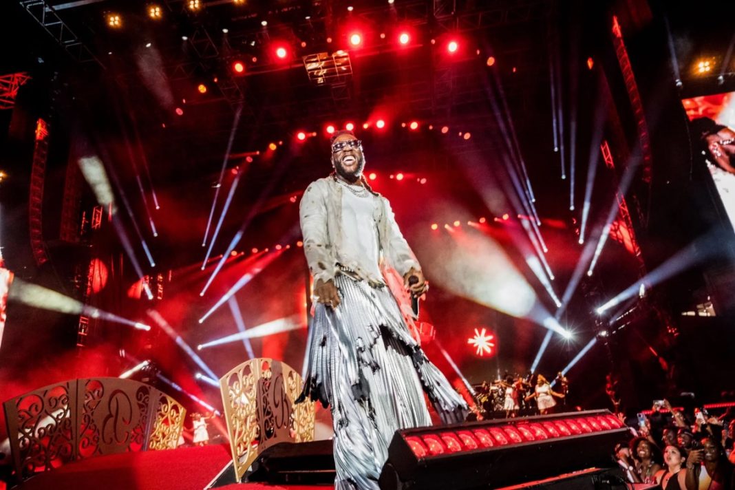 Burna Boy performs on stage at his concert at the Citi Field, in New York City on July 8, 2023. | Sacha Lecca/Rolling Stone