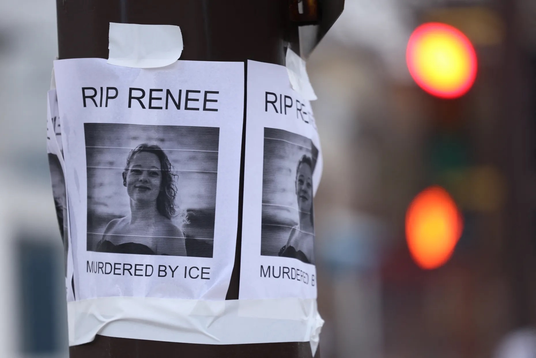 A picture is displayed at a makeshift memorial for Renee Nicole Good, who was shot and killed at point blank range on Jan. 7 by a US Immigration and Customs Enforcement (ICE) agent as she apparently tried to drive away from agents who were crowding around her car, in Minneapolis, Minnesota, on Thursday, January 7, 2026. | Charly Triballeau/AFP via Getty Images