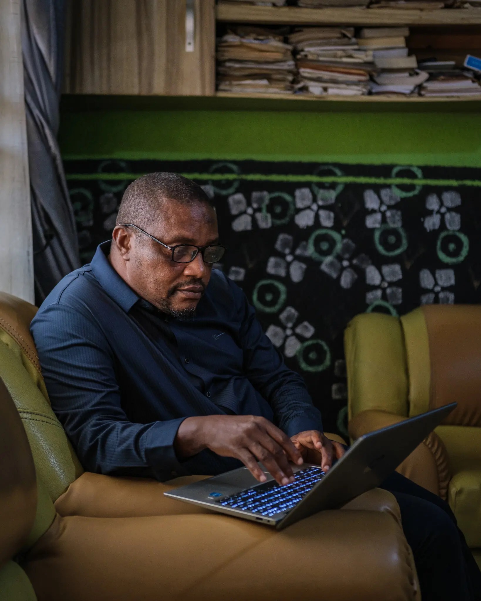 Emeka Umeagbalasi, 56, at his home in Onitsha, Nigeria, in December 2025. | Taiwo Aina for The New York Times