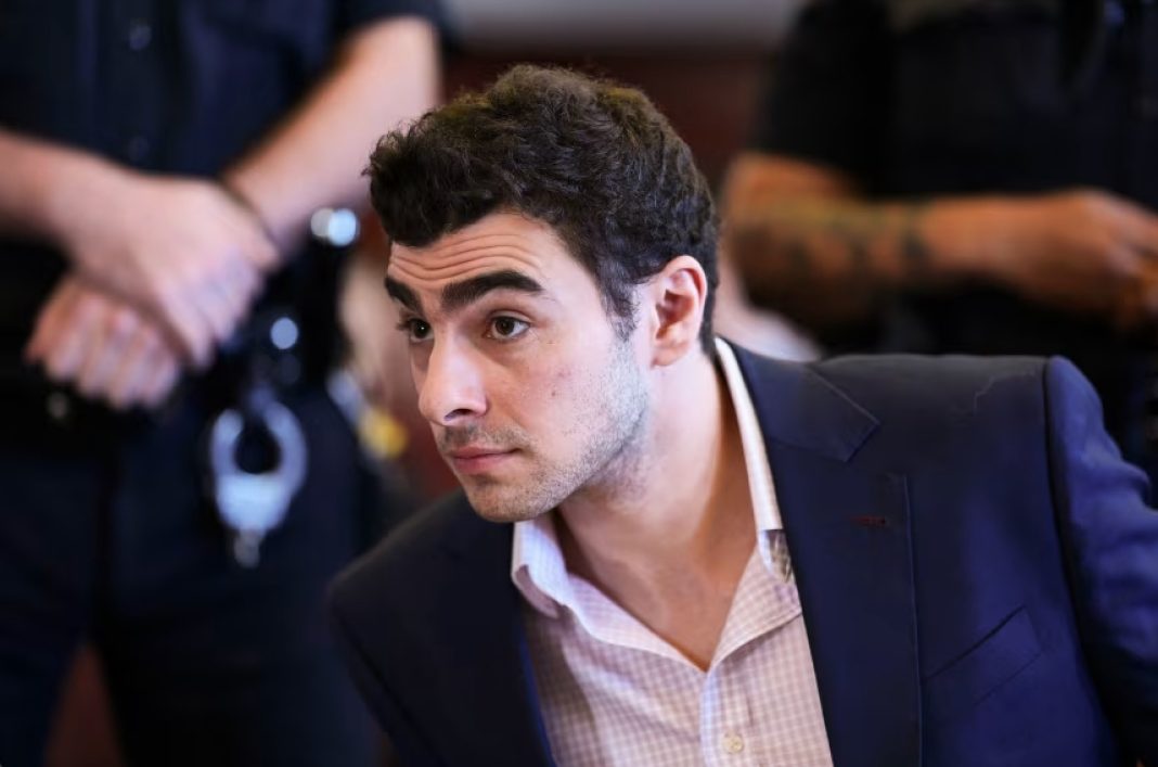 Luigi Mangione appears for a suppression of evidence hearing in the killing of UnitedHealthcare CEO Brian Thompson in Manhattan Criminal Court on December 9, 2025 in New York City. | Curtis Means/Pool/Getty Images