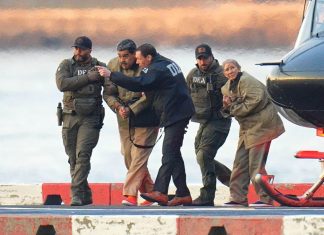 Maduro, Wife Plead Not Guilty in New York as Lawyers Challenge Legality of Their Capture Venezuelan President Nicolás Maduro and his wife, Cilia Flores, enter federal custody after arriving in New York, where they pleaded not guilty before Judge Alvin Hellerstein in the Southern District of New York on Monday, January 5, 2026. They are seen here being escorted by U.S. federal agents after disembarking from a helicopter.