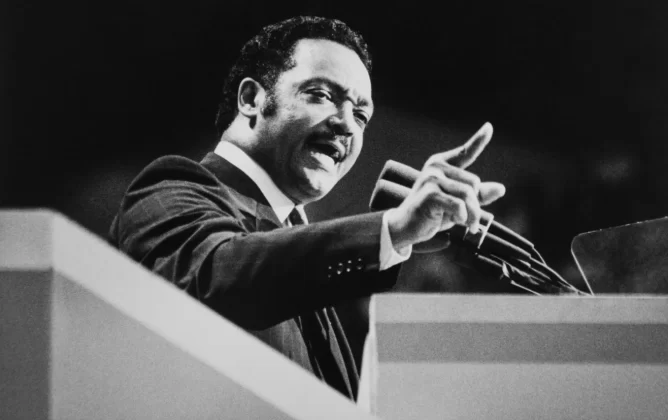 The Rev. Jesse Jackson gives a speech during his presidential run in 1988. Andrea Mohin/CQ Roll Call/AP