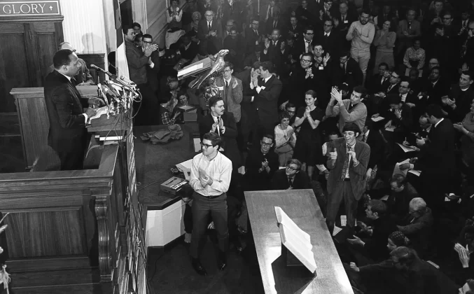 Jackson is seen inside the doorway at the top left as Martin Luther King Jr. speaks at a church in Washington, DC, in February 1968. Jackson was a close aide to King, who was assassinated two months later. Joseph Klipple/Getty Images
