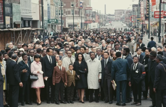 A crowd marches in Memphis several days after King's assassination. Jackson is at center, behind King's widow, Coretta. Santi Visalli/Archive Photos/Getty Images