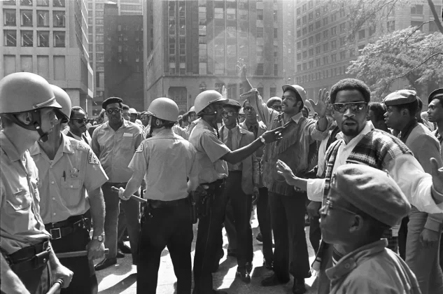 Jackson, at right with his hands up, speaks with police as leads a September 1969 rally in Chicago. Protesters were calling for an end to discrimination in the construction trade. Gary Settle/The New York Times/Redux