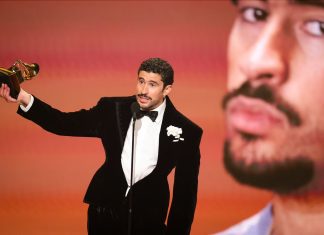 Bad Bunny Makes History With Album of the Year Win at the 2026 Grammys LOS ANGELES, CA – FEBRUARY 2026: Bad Bunny poses backstage after winning Album of the Year for DeBÍ TiRAR MáS FOToS at the 2026 Grammy Awards. The global superstar was nominated in multiple categories, including Record of the Year and Song of the Year, making history with his wins and nominations. | CBS Photo Archive/Getty Images