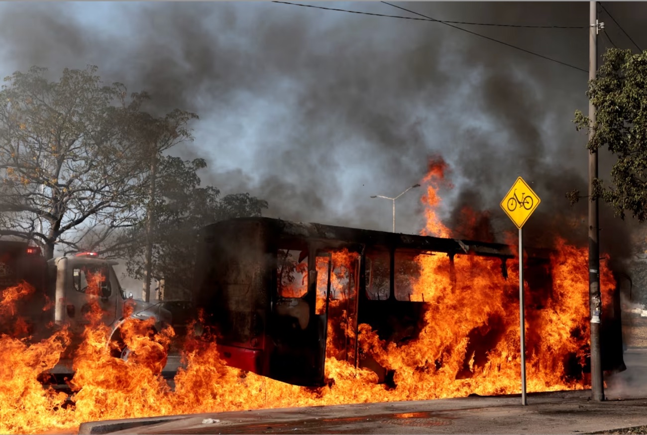 A bus, set on fire by