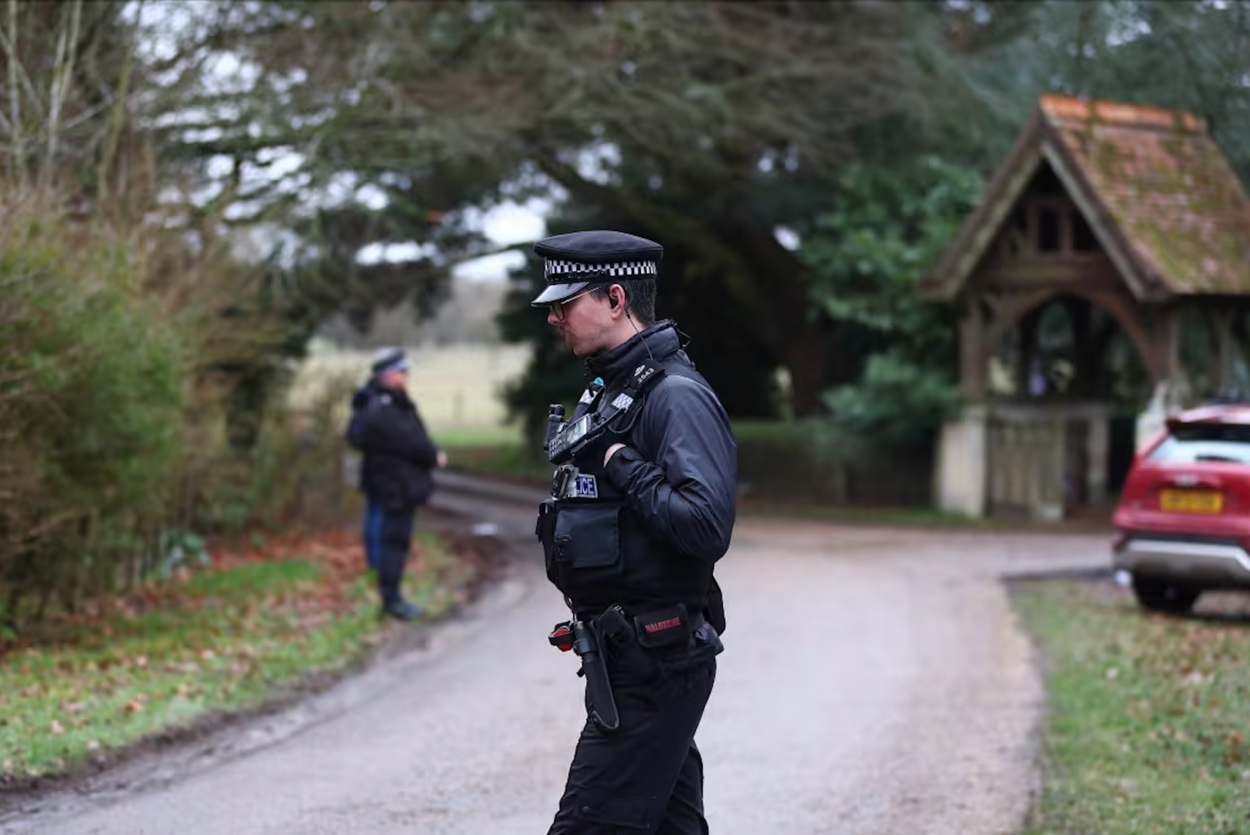   Police officers near the home of Andrew Mountbatten-Windsor in Norfolk, England today, Thursday, February 19, 2026. |  Peter Nicholls / Getty Images 