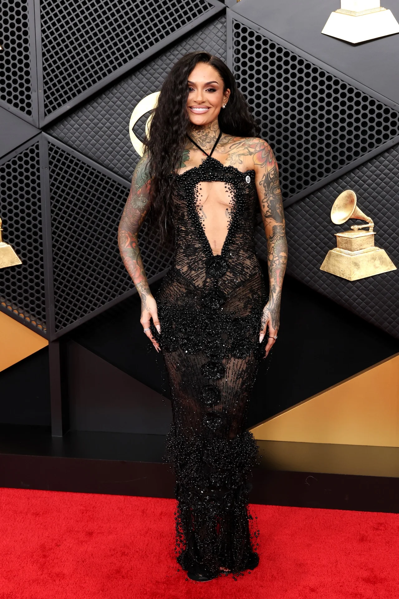 LOS ANGELES, CALIFORNIA – FEBRUARY 01: Kehlani arrives at the 68th GRAMMY Awards wearing Valdrin Sahiti. The historic music industry event held at Crypto.com Arena on Sunday, February 1, 2026, in Los Angeles, California. | Amy Sussman/Getty Images