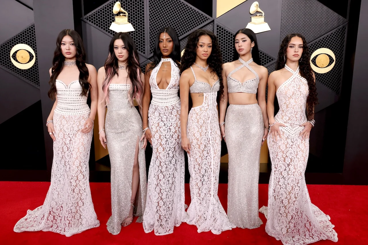 LOS ANGELES, CALIFORNIA – FEBRUARY 01: Members of KATSEYE, Yoonchae Jeung, Megan Skiendiel, Lara Raj, Manon Bannerman, Sophia Laforteza, and Daniela Avanzini, arrive at the 68th GRAMMY Awards wearing Ludovic de Saint Sernin. The historic music industry event held at Crypto.com Arena on Sunday, February 1, 2026, in Los Angeles, California. | John Shearer/Getty Images for The Recording Academy