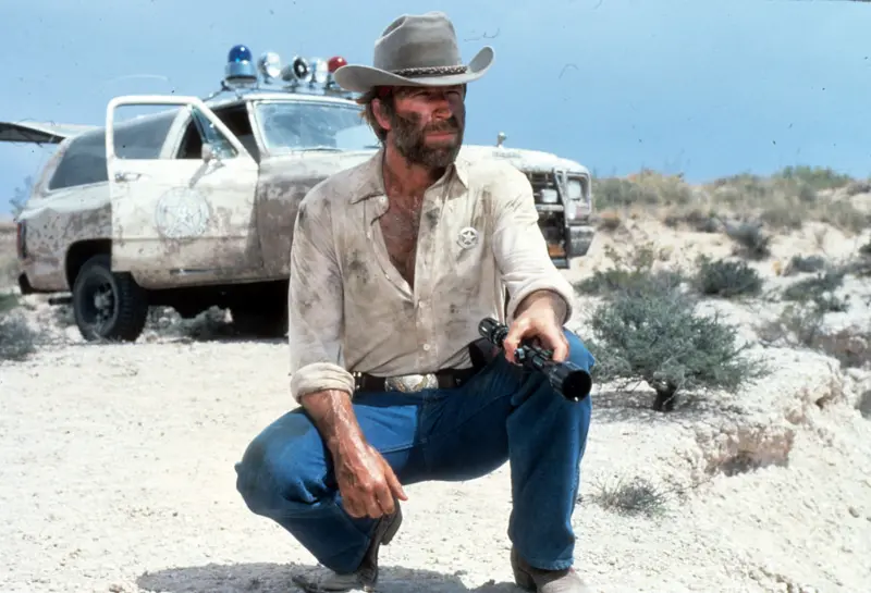 As a renegade Texas Ranger in a scene from the film Lone Wolf McQuade in 1983