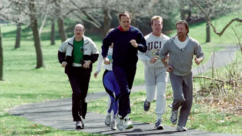 Then-US President George HW Bush Sr is seen jogging with Chuck Norris in Washington DC in 1990 | Getty Images