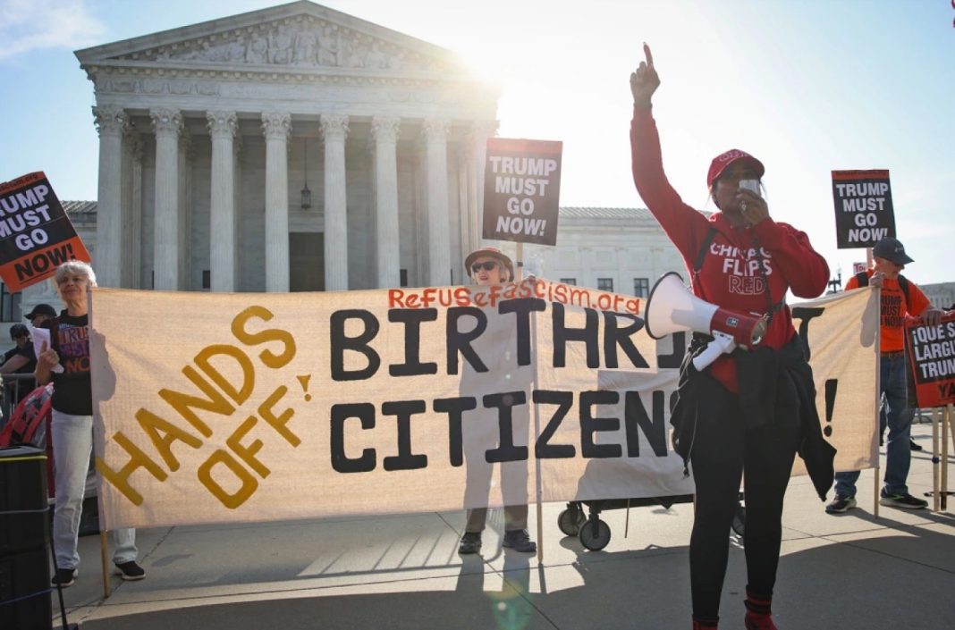 Demonstrators protest outside the Supreme Court on Wednesday.
