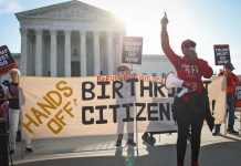 US Supreme Court Hears Arguments on Trump’s Bid to Restrict Birthright Citizenship Demonstrators protest outside the Supreme Court on Wednesday.