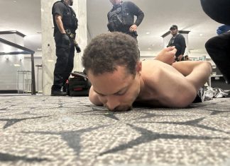 Suspect in White House Correspondents’ Dinner Shooting Charged with Attempted Assassination of Donald Trump
Law enforcement personnel detain Cole Tomas Allen, a suspect in the shooting incident at the White House Correspondents' Association dinner, in Washington, D.C., U.S. April 25, 2026. | DONALD J TRUMP via Truth Social/Handout