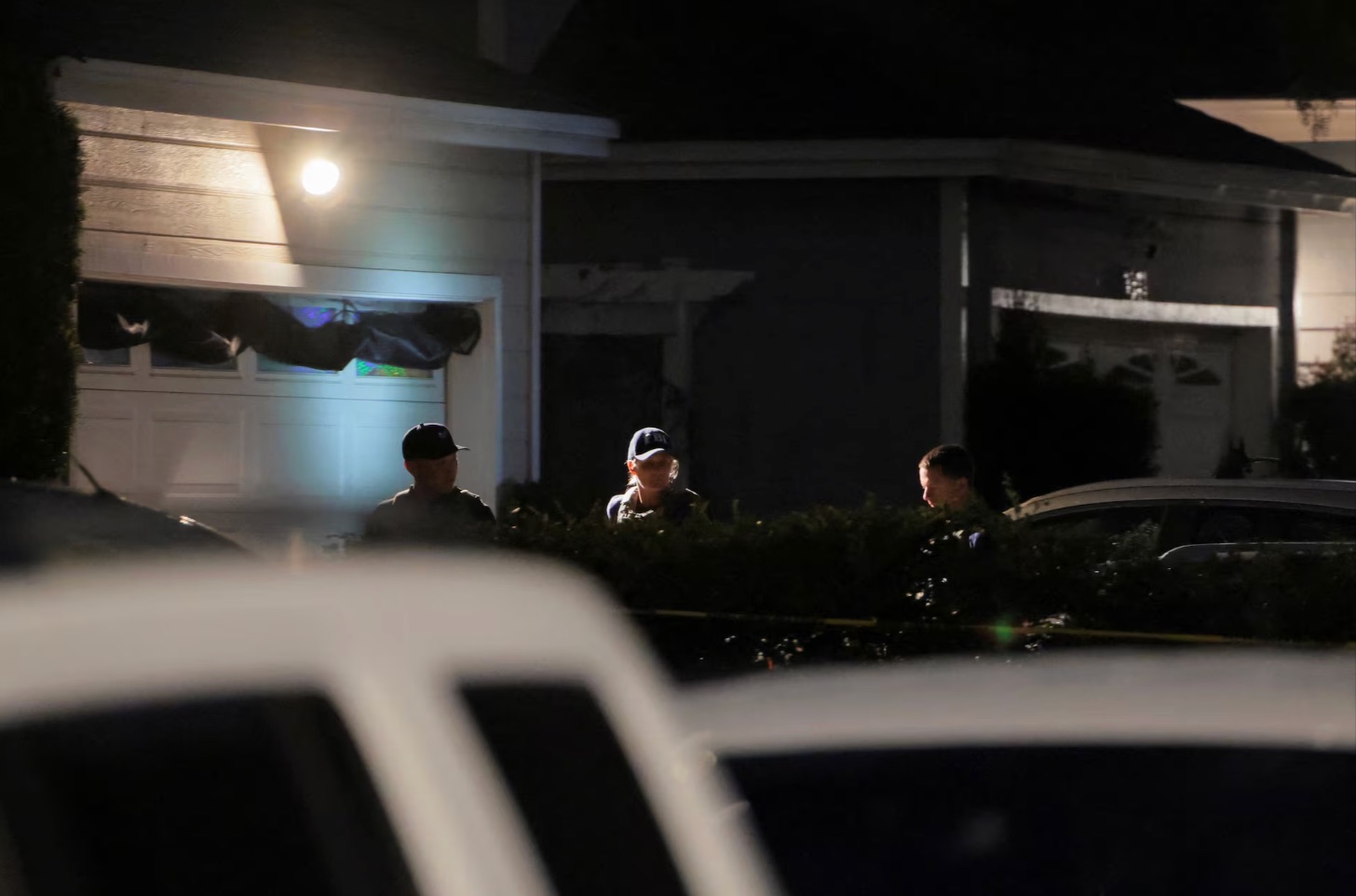 FBI agents work outside the residence associated with Cole Tomas Allen, the suspect in the shooting incident at the annual White House Correspondents' Association dinner in Washington, D.C., in Torrance, California, U.S.,