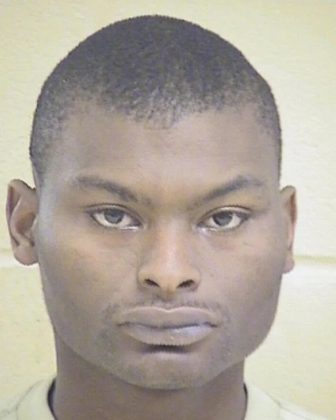 A photo shows Shamar Elkins, whom the Shreveport Police Department says is "the individual responsible for this heinous act" in which eight children were shot and killed. Shreveport Police Department