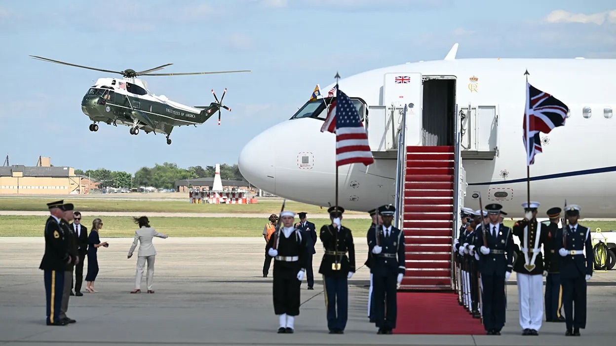An honour guard is stands by as the helicopter carrying Britain's King Charles III prepares...